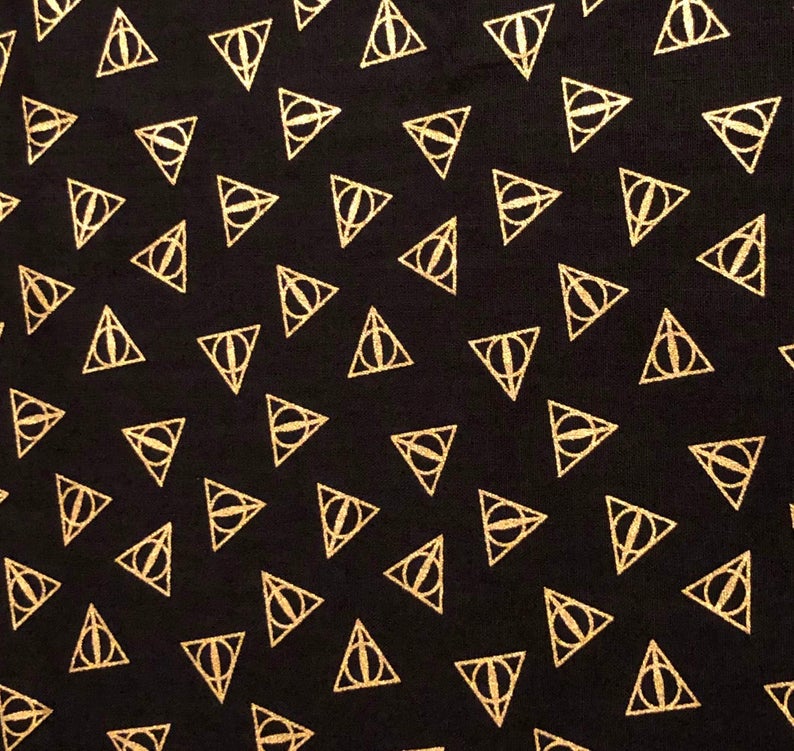 Harry Potter Deathly Hallows Logo Black Gold Metallic Textured Camelot Cotton Fabric CF-23800109L-1