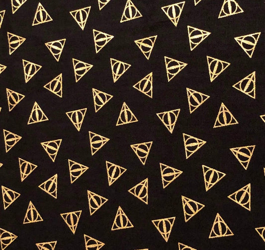 Harry Potter Deathly Hallows Logo Black Gold Metallic Textured Camelot Cotton Fabric CF-23800109L-1