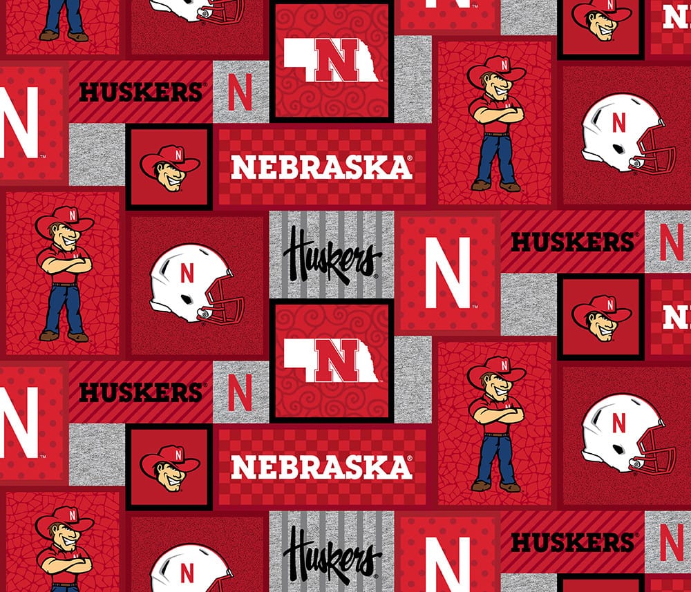 Nebraska Cornhuskers NCAA College Patch Sykel Enterprises Polyester FLEECE Fabric NE-1177 | US Fabric Shop