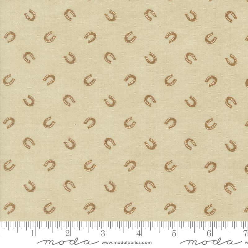 Saddle Ranch Lucky Horseshoe Tossed Tonal in Trail Dust Beige designed by Moda Fabrics 44 inches wide 100% Cotton Quilting Fabric